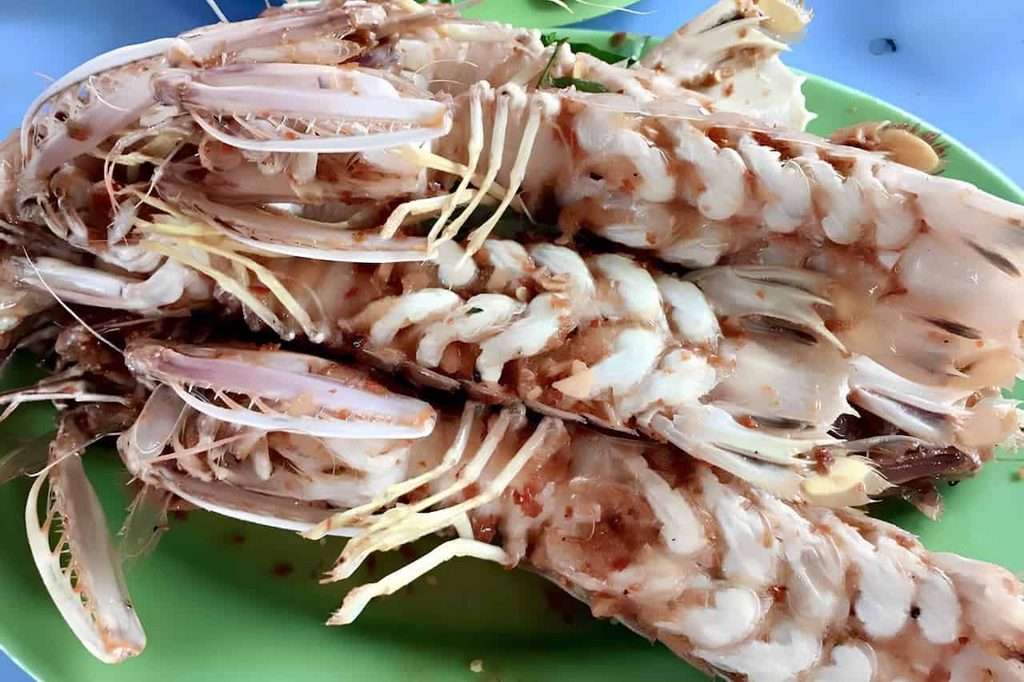 Fresh mantis shrimp served during a seafood meal in Can Gio, Vietnam