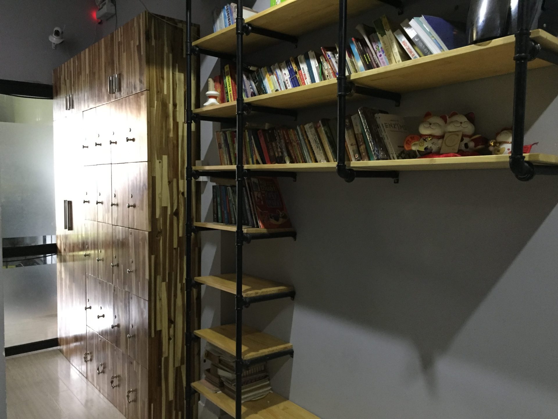 bookshelf and lockers at O.M.E hostel - Quy Nhon, VIetnam