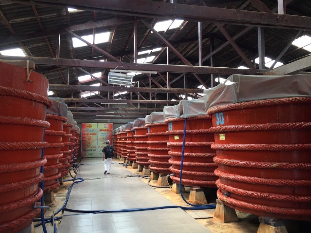 fish sauce stored in huge barrels at one manufacturer at Phu Quoc Island, Vietnam
