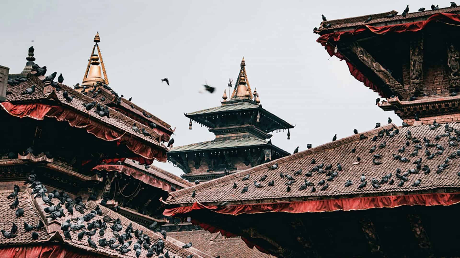 Traditional temple architecture and red tiled rooftops in Kathmandu Nepal