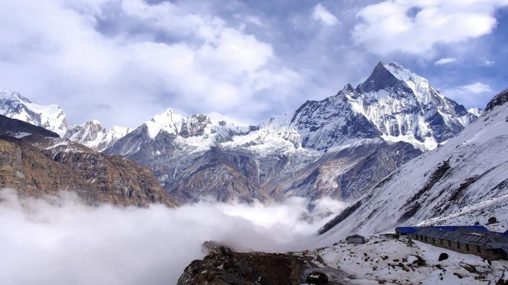 Snow-covered Himalayan mountains and trekking trail in Nepal