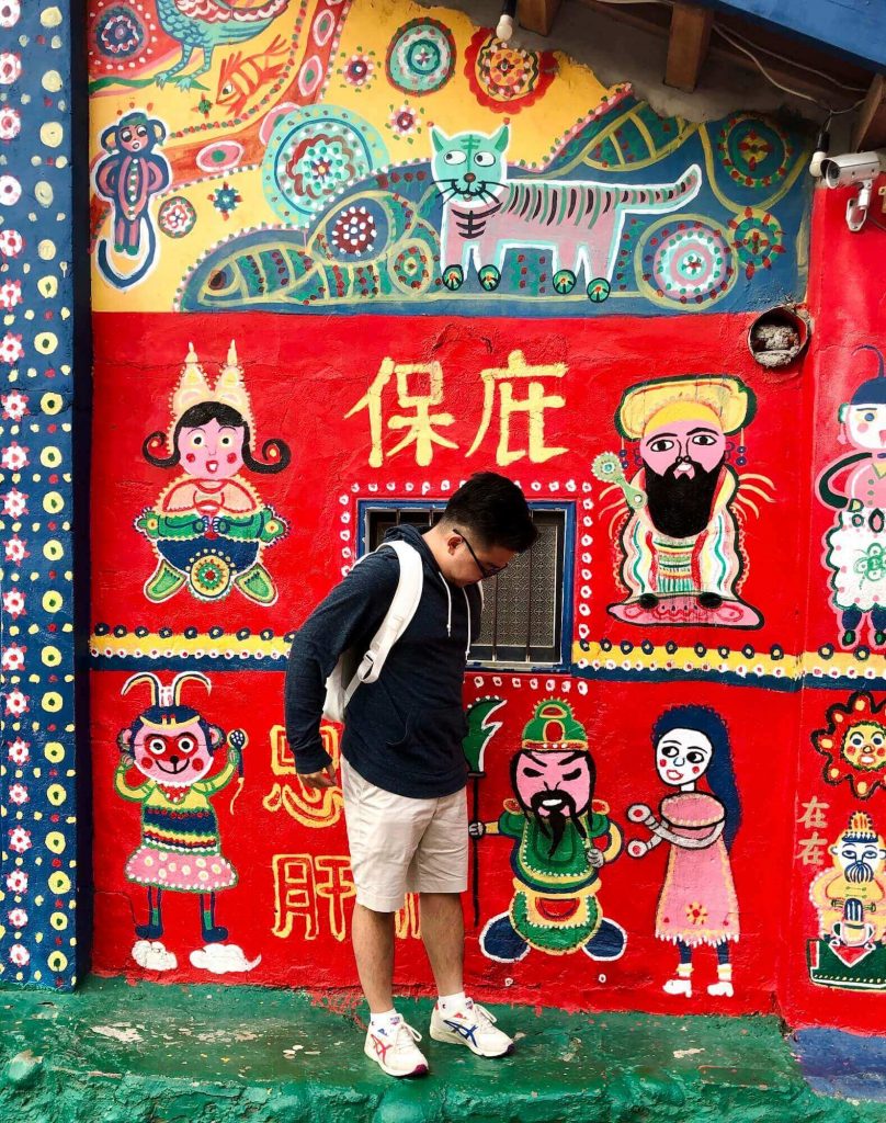taking pic with colorful background at Rainbow Village, Taichung, Taiwan
