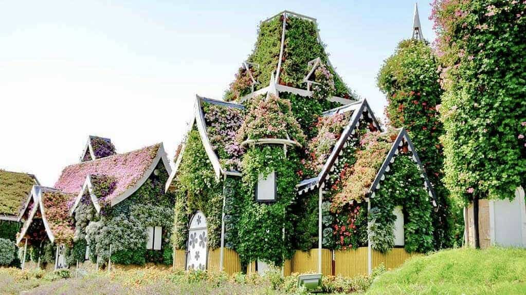 Colourful flower-covered houses at Dubai Miracle Garden