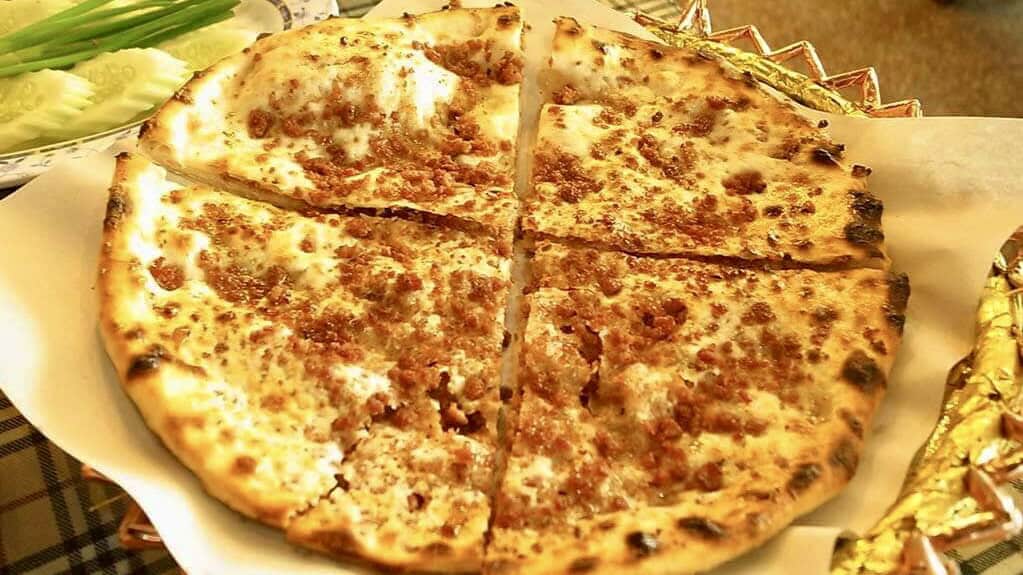 Traditional Middle Eastern flatbread served with fresh vegetables