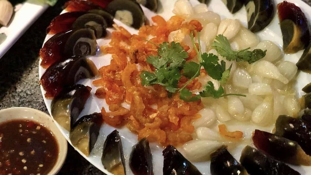 Chinese century eggs served with preserved foods