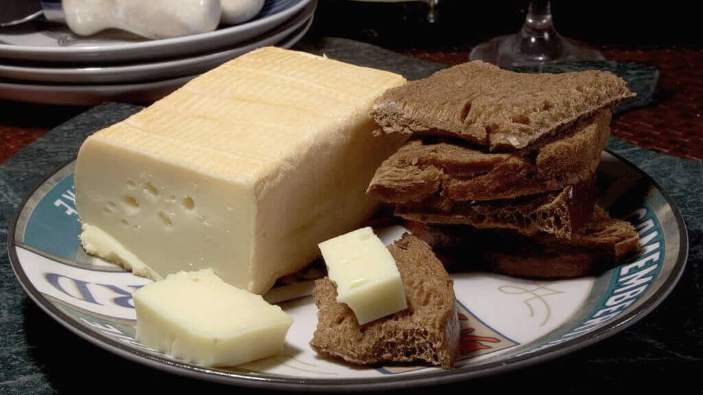 Limburger cheese with bread on a plate