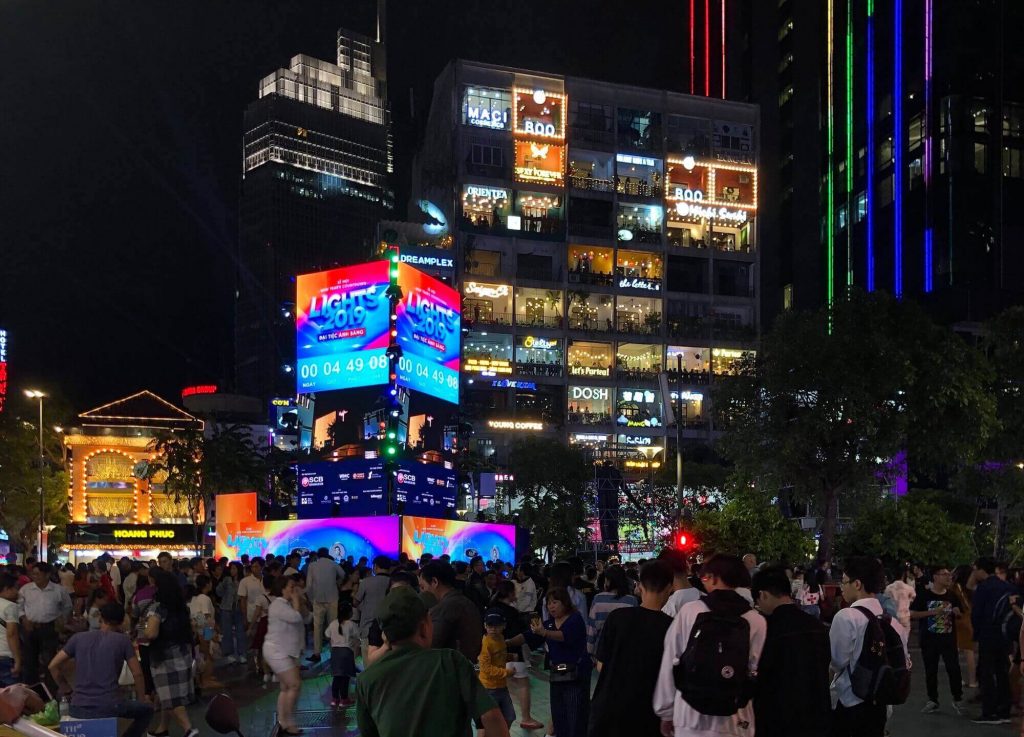 People in HCMC gather at the central walking street to enjoy the count down in NYE 2019