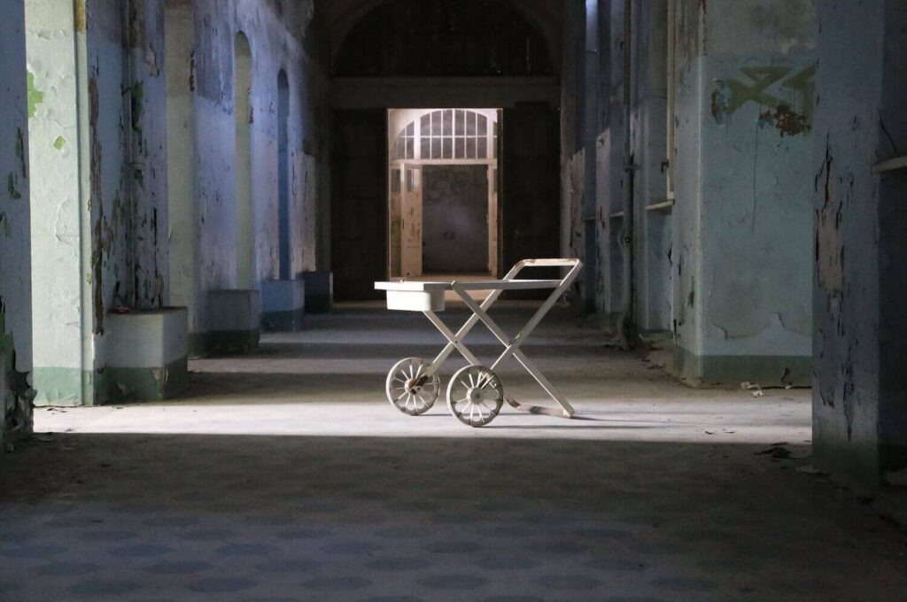 abandoned hallway of Beelitz Heilstätten Sanatorium