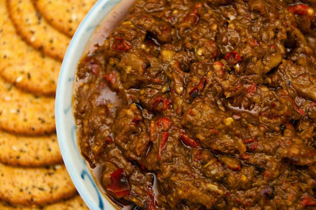 Moroccan Zaalouk is made by dry roasted eggplant, fried with garlic, paprika, and cumin