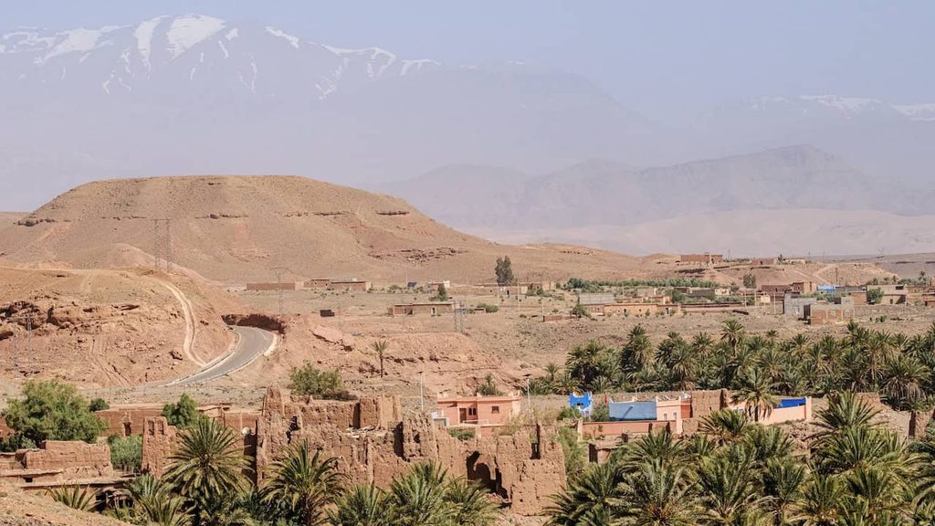 Oasis valley and traditional villages surrounded by the Atlas Mountains in Morocco