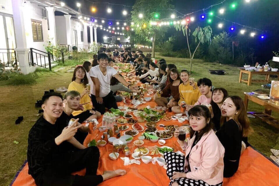 a group of friends having dinner at doi co thom resort