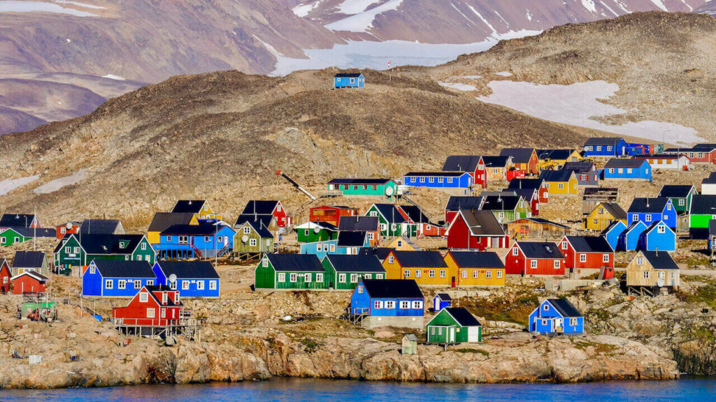 colorful houses in Ittoqqortoormiit, one of the most remote destinations in the world