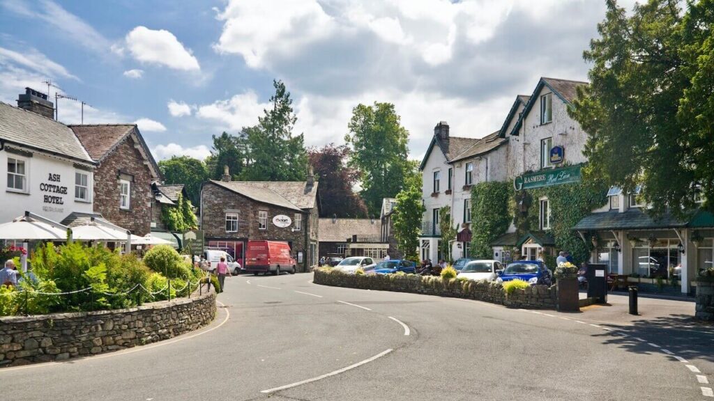 houses and cars in the village of Grasmere