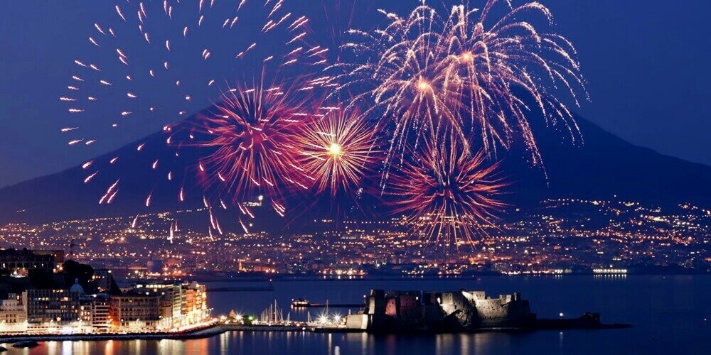 fireworks across the city of Naples on New Year's Eve