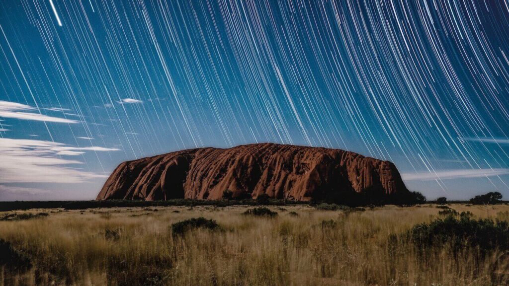 The sky of lights Uluru, one of spiritual destinations in the world