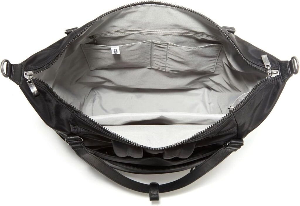 Interior of the Baggallini Nolita Convertible Backpack showing its spacious main compartment and organized pockets