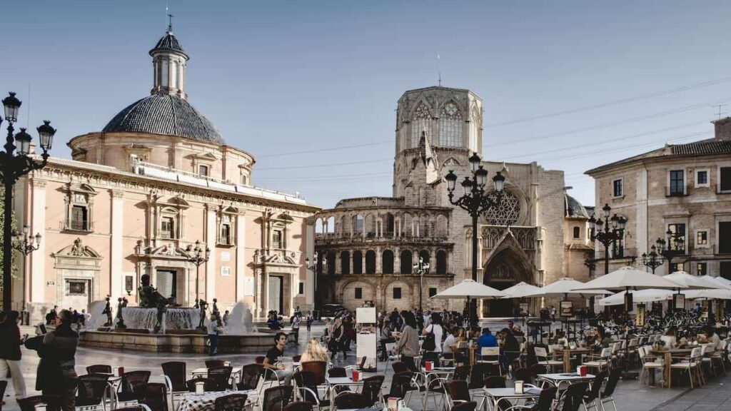 Valencia's a historical place with many tourists and cafes
