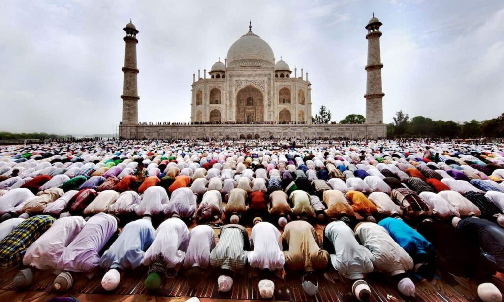people pray at the Taj Mahal during Eid al-Fitr