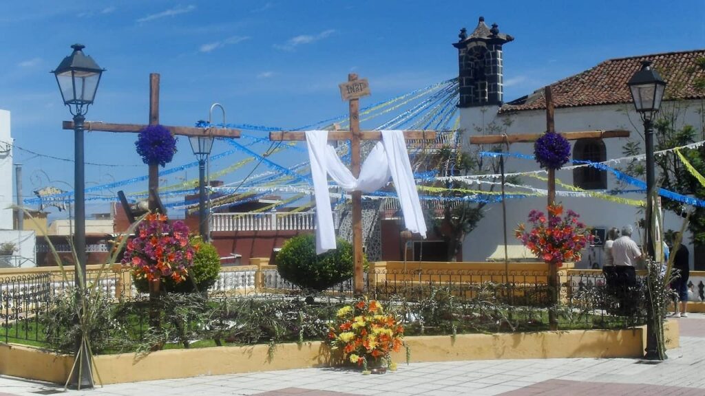 decorated crosses with flowers and plants in the La Fiesta de las Cruces