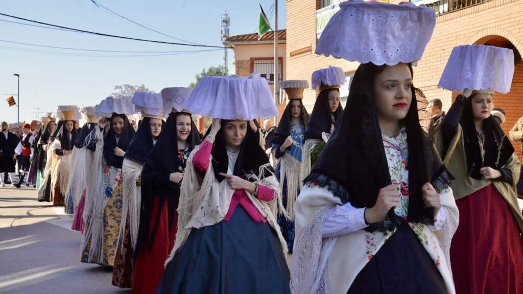 women join La Fiesta de Santa Águeda in traditional Basque costumes