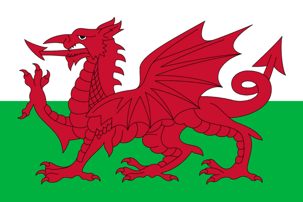 the flag of Wales with the image of a Red Dragon monster destinations