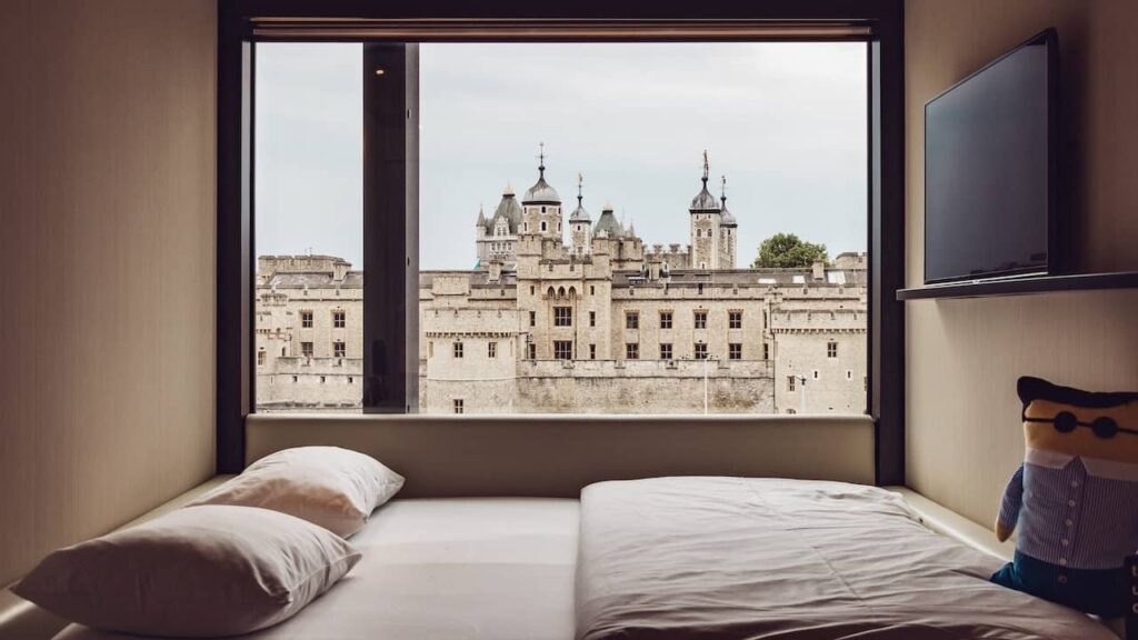 a hotel room with a view of the Tower of London