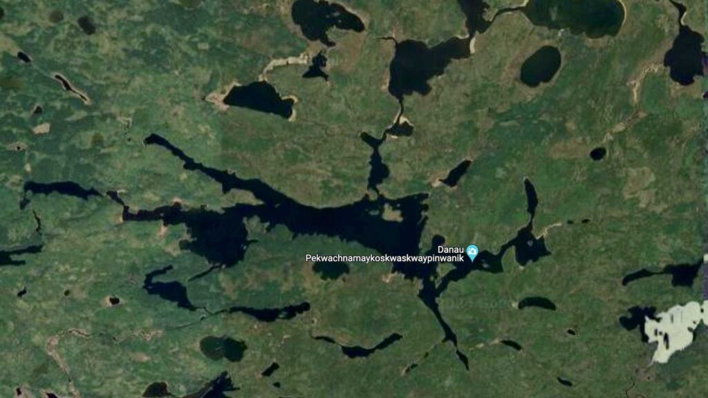 A satellite image of lake Pekwachnamaykoskwaskwaypinwanik in Manitoba Canada