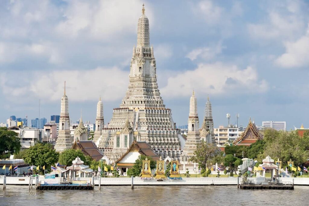 beautiful Wat Arun temple by a river in Bangkok Thailand
