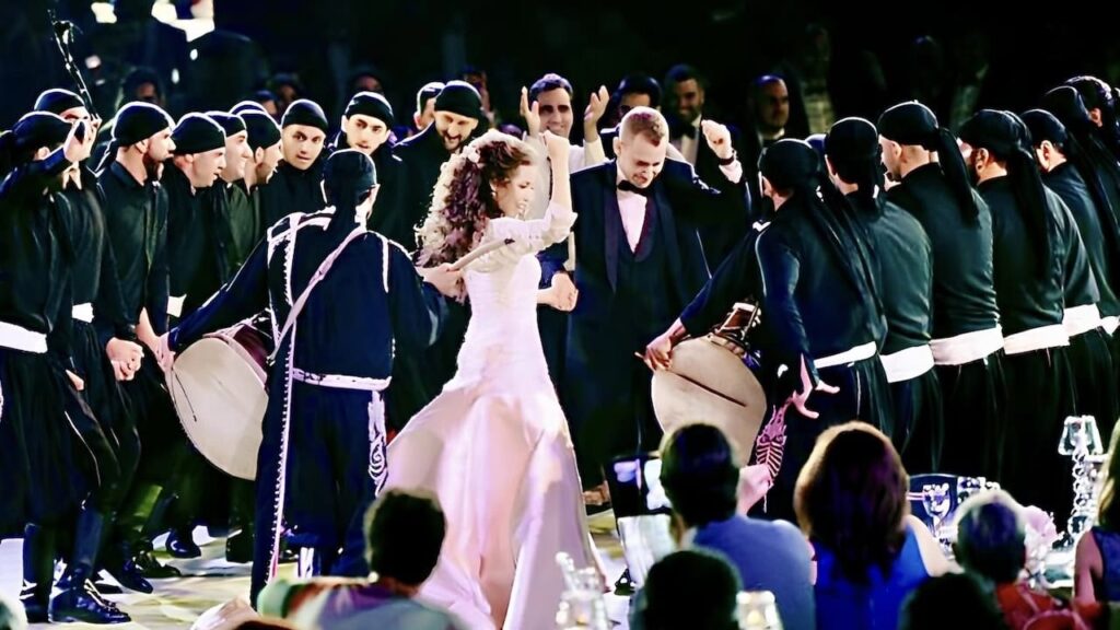 Arab wedding zaffa procession with traditional dabke dance and drummers celebrating cultural wedding traditions