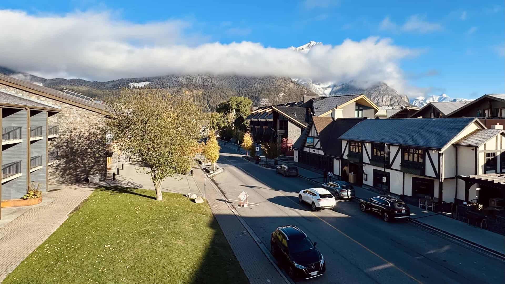 Banff Park Lodge review featured image showing downtown Banff street with mountain views in Canada