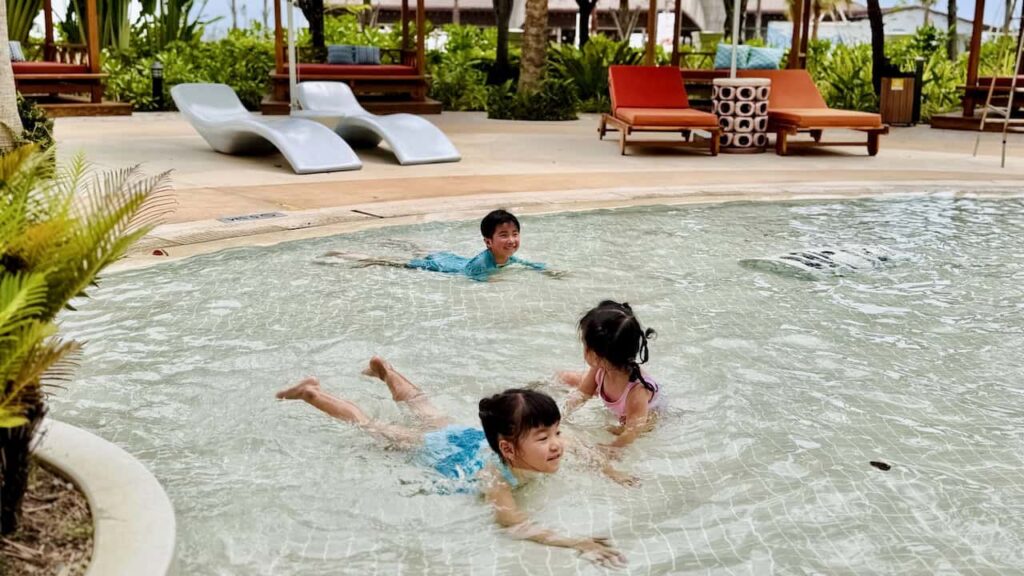 Children enjoying the shallow swimming pool