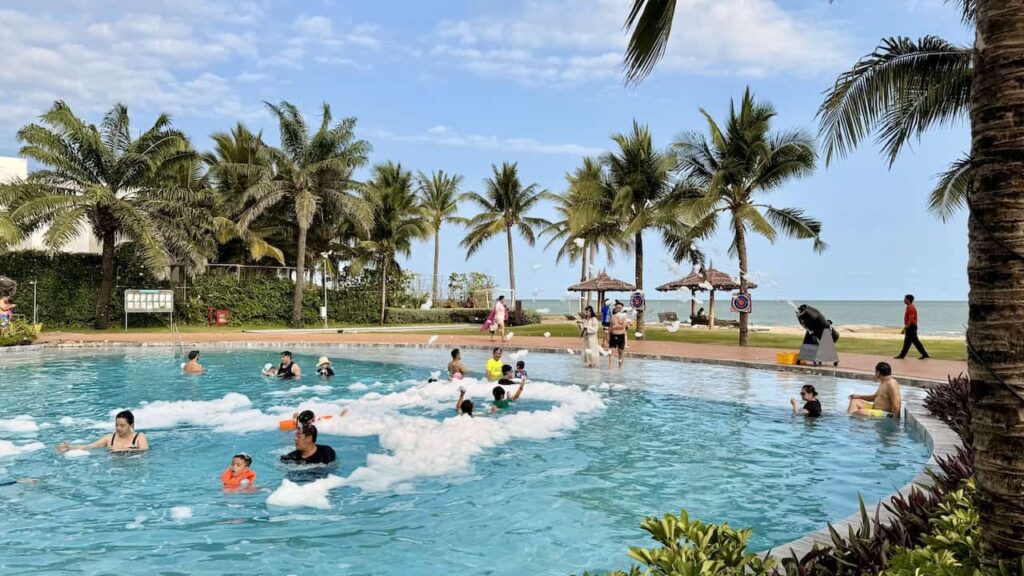 Families enjoying the weekend foam party at the swimming pool at Dhawa Ho Tram.
