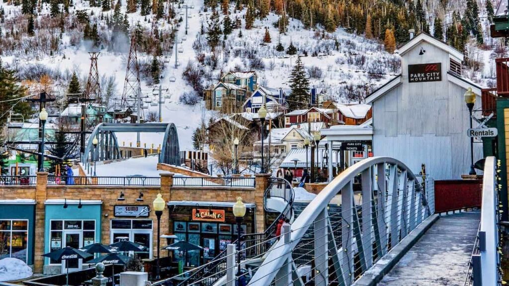 Snow-covered Park City, Utah, with ski slopes, chairlifts, and mountain scenery